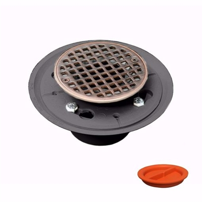 Jones Stephens 2 inch x 3 inch PVC Shower Drain with 2 inch PVC Spud and 4 inch Round Old World Bronze Strainer with Test Plug D5001WBTP