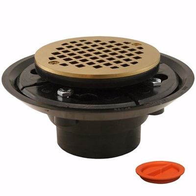 Jones Stephens 2 inch x 3 inch ABS Shower Drain with 2 inch ABS Spud and 4 inch Round Polished Brass Cast Strainer with Test Plug D50332TP