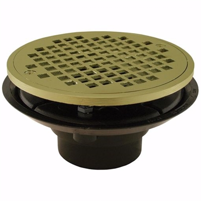 Jones Stephens 2 inch x 3 inch ABS Shower Drain with 2 inch Brass Spud and 6 inch Round Polished Brass Strainer D50832